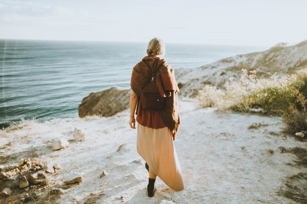 Woman On Top Of Mountain